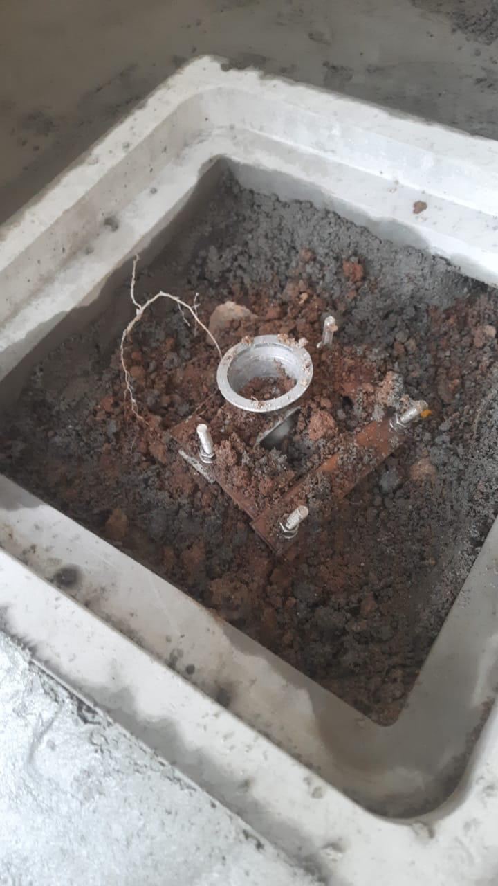 Earth pit installation with earthing conductor and backfill