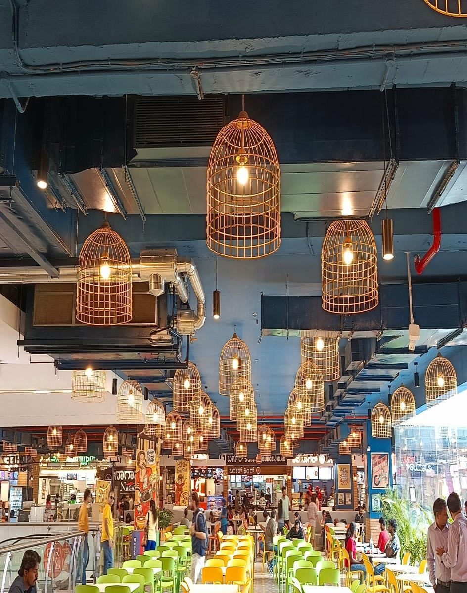 Food court HVAC ductwork installed above a mall dining area in Bangalore